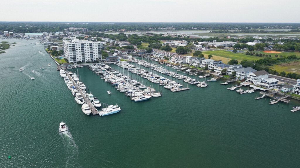 Boats Docked at Marina - Wilmington North Carolina - Wide Shot - Houses and Apartment